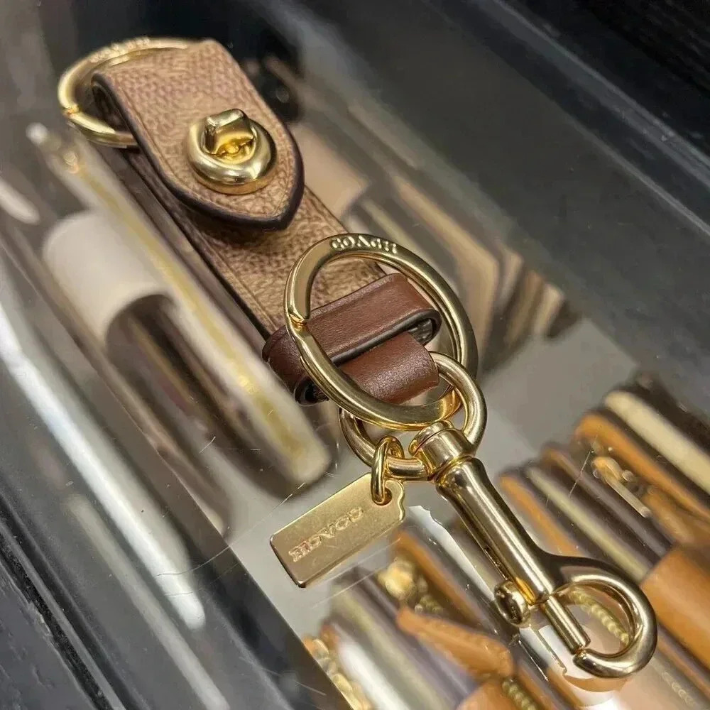 Coach CY235 Trigger Snap Bag Charm In Signature Canvas
